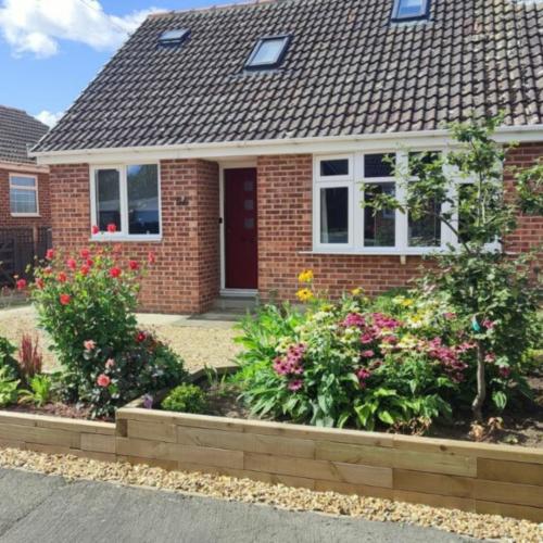 Andrea's voortuinproject met plantenbak